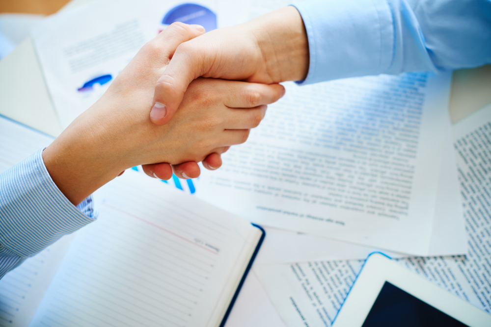 two people shaking hands