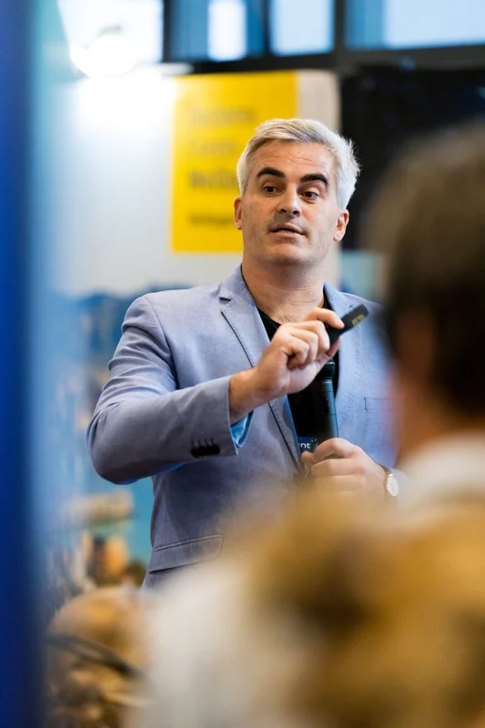 A person holding a conference