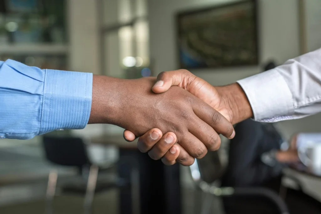 two guys shaking hands